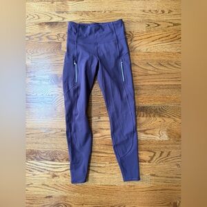 Athleta plum colored Leggings with Zipper Pockets